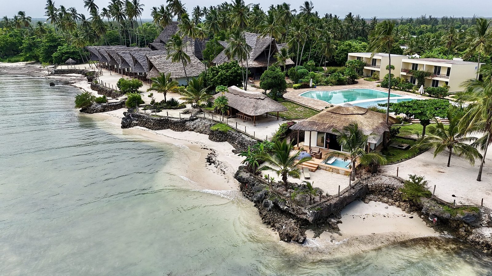 Aerial view of Maharaja Boutique Hotel, pool and beachfront in Uroa, Zanzibar