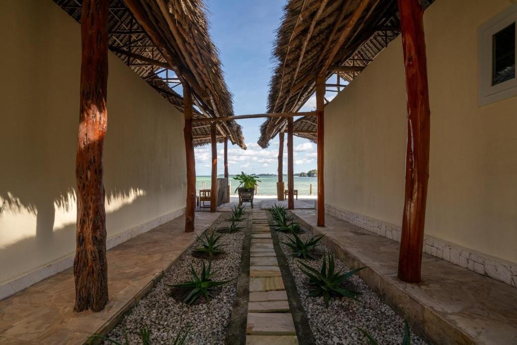 Beachfront terrace with loungers