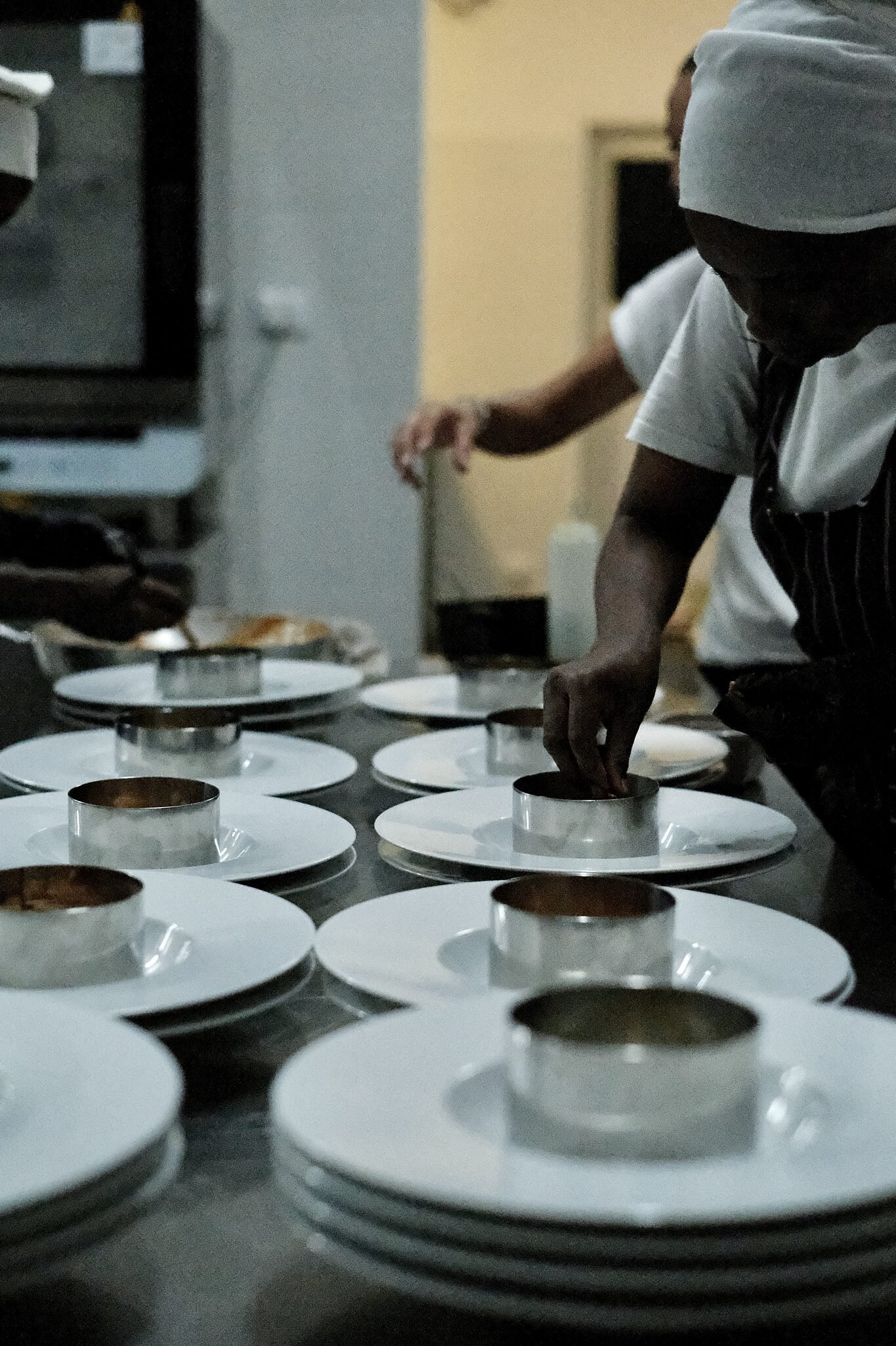 Maharaja chefs plating dishes in the kitchen