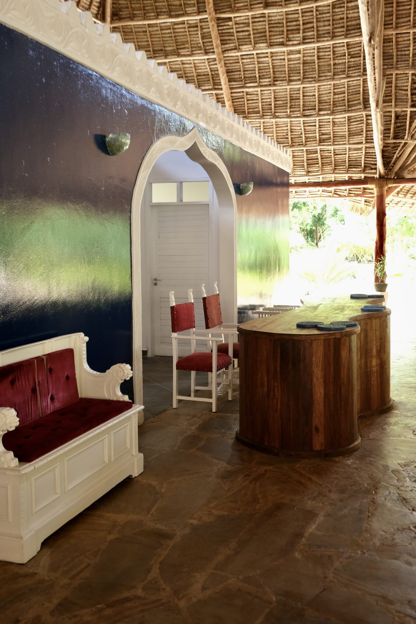 Intimate lounge seating area with Zanzibari design details