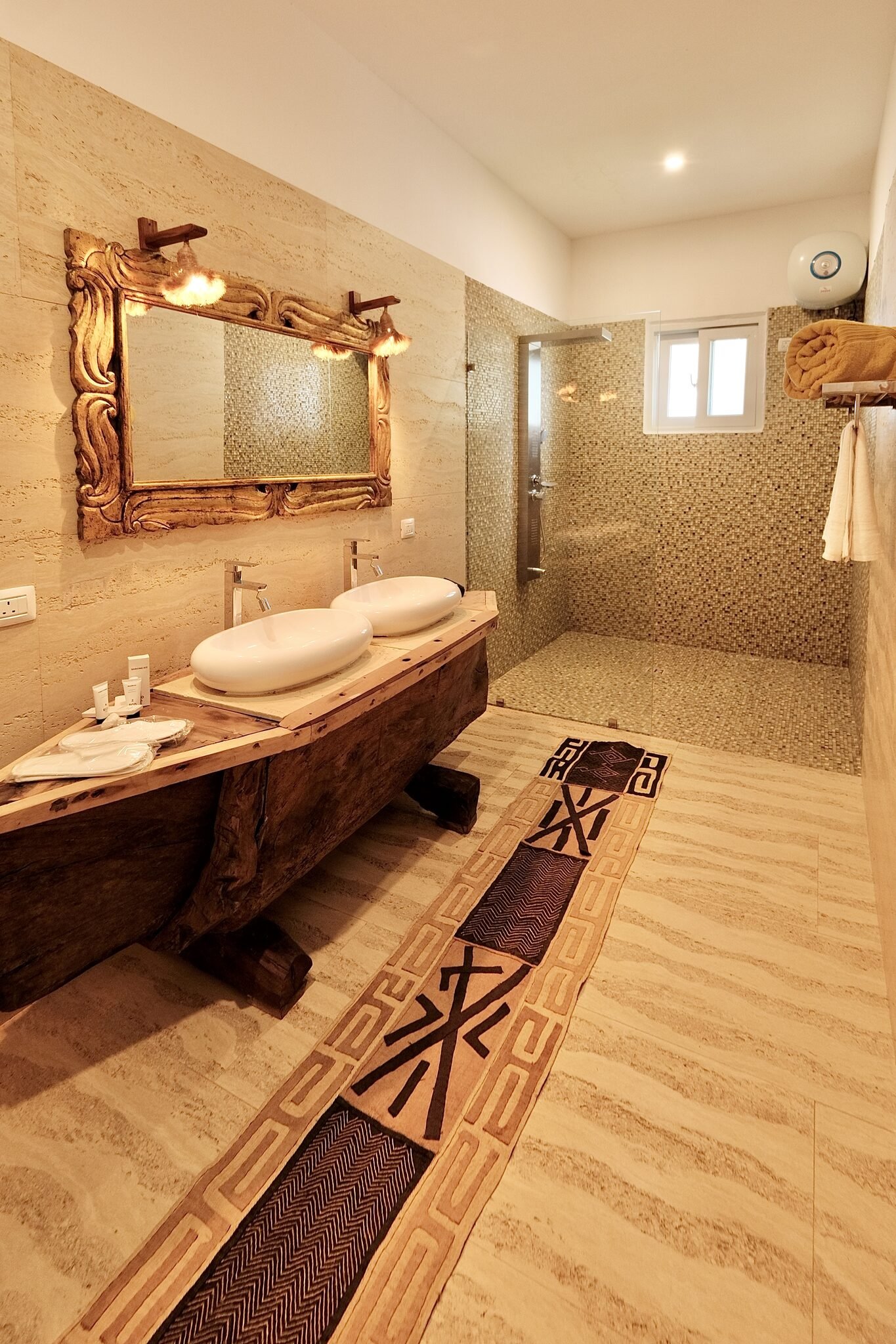 Luxury Villa bathroom with carved mirror and twin basins
