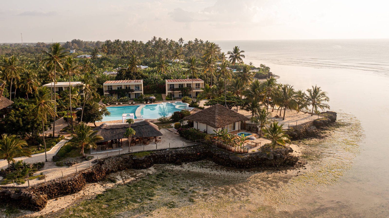 Private beach at Uroa with white sand and turquoise water