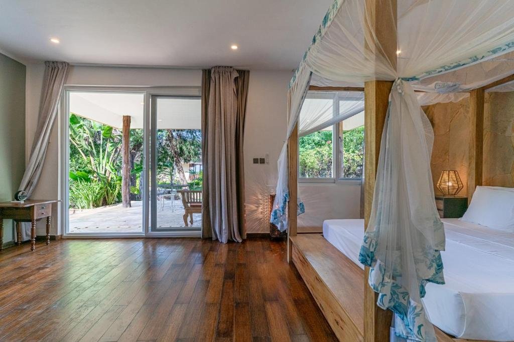 Luxury Villa interior with private jacuzzi and garden view